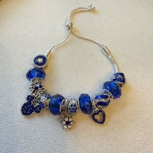 Elegant Blue and Silver Charm Bracelet